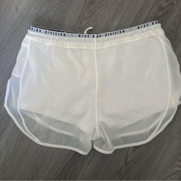 Nike White Athletic Shorts with Elastic Waistband and Curved Hem - Picture 11 of 11